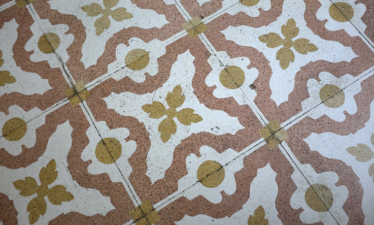 ancient flooring with cement tiles